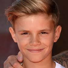 Romeo Beckham is now a godfather