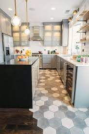 Laying oblong tiles in a herringbone shape is also trending across both kitchen floors and walls. Black Hexagon Tile Floor Kitchen Novocom Top