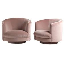 A swivel, spinny, or revolving chair is a chair with a single central leg that allows the seat to rotate 360 degrees to the left or right. A Pair Of 1960s Swivel Tub Chairs 1stdibs Com Chair Tub Chair Furniture Chair