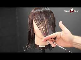 Comb out sections of the hair and trim the ends, holding the scissors angled vertically away from the head to create the layers. Haircut Tutorial 2014 Layered Bob Haircut Thesalonguy Youtube Medium Hair Styles Medium Length Layers Medium Layered Haircuts