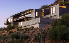 Design and construction as want to read Concrete Glass And Steel Structure Hovers Above Arizona Desert