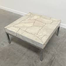 Stone coffee tables can be long and rectangular and consist of a thin layer of stone to decorate the top of the frame. Vintage Square Stone Coffee Table 1970s 165148