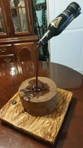 Gravity Defying Cake We Used Riesen Candy For The Puddle And Beer Pour Ampis Baked Creations Gravity Defying Cake Birthday Cake Beer Beer Cake