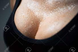 Closeup Portrait Of A Female Sexy Big Wet Breast. Young Beautiful Girl  Shows Her Gorgeous Breasts. Woman Body Stock Photo, Picture and Royalty  Free Image. Image 127076743.