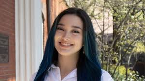 Senior Profile: Emma Downs inspires change at Tufts through JumboSwipes,  theater