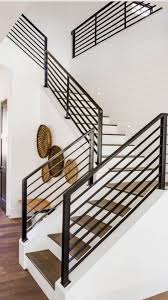 Transitional modern staircase design made with black iron. Pin By Helga Mair On Decoracao Modern Staircase Stairs Design Modern Modern Stair Railing