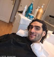 I think it looks weird. Manchester United Star Marouane Fellaini Gets A Haircut Daily Mail Online