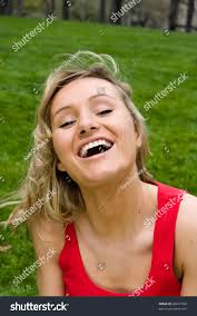 20s Blonde Girl Sitting On Grass Stock Photo 28927780