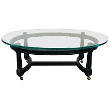 1910s antique french satinwood coffee table with glass tray brass mounts & feet. Vintage Oval Glass Top And Black Wood Coffee Table For Sale At 1stdibs
