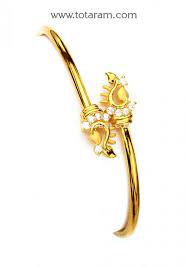 22k Gold Bangle Bracelet With Cz Gbr1422 Buy This Indian Jewelry Design From Totaram Jewelers For A L 22k Gold Jewelry Gold Jewelry Bangles Jewelry Designs