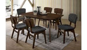 More than simply a seat at a table, the right chairs allow you to add personality and fun to your dining room while also encouraging guests to linger over a good meal and great conversations. Gildyn Mid Century Modern Dining Table Set