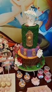 The mad hatter explains to alice that he and the march hare are always having tea because, when he tried to sing for the queen of hearts at a celebration of hers, she sentenced him to death for. Alice In Wonderland Garden Party Cake Cake By The Sugar Cakesdecor