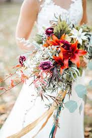I'd use the largest of the oasis bouquet holders as cascade bouquets tend to be quite full. Cascading Bouquet Flower Centerpieces Wedding Cascading Wedding Bouquets Fall Wedding Bouquets