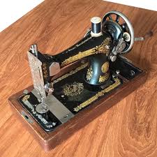 Image result for singer 28k