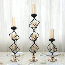 Get taper candle holders for your wedding or to decorate your home like this beautiful, small antique solid metal candlestick holder in gold. Metallic Gold Black Wholesale Geometric Candle Holders With Amber Glass Votives Buy Votive Glass Candle Holder With Metal Stand Tall Metal Candle Holders Decorative Flower Metal Candle Holder Product On Alibaba Com