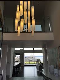 We did not find results for: Pendant Lighting For High Ceiling Foyer By Galilee Lighting The Chandelier Is Available In Any Size Or Le Ceiling Lights High Ceiling Lighting Entry Lighting