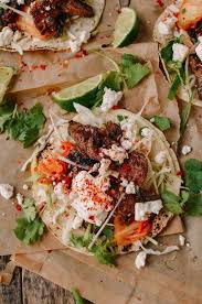 Beef Bulgogi Tacos Recipe By The Woks Of Life Are An Incredible Korean Mexican Fusion Dish The Idea Of Putting Beef Bulg Bulgogi Tacos Bulgogi Fusion Food