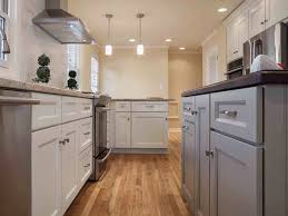 Sherwin williams dover white on kitchen cabinets is one of the best cabinet paint colors you'll find! Aspect Cabinetry Swingle Countertops