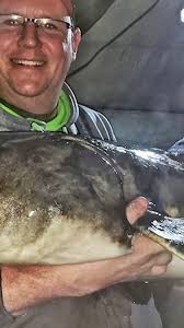 Ice fisherman lands record sturgeon