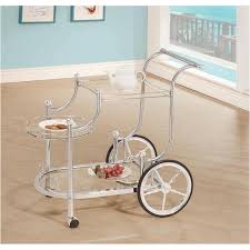 The main compartment has two drawers, one adjustable intermediate shelf, three brass stemware holders, one narrow section on the left with three mini compartments, and a right compartment with stainless steel skids to hold a forbes hot box. 910076 Coaster Furniture Dining Room Serving Cart