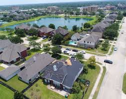 Birds Eye View Of A House Roof Bird S Eye View Of Our Roof Installment In Pearland Tx Roof Architecture Modern Roofing Patio Flooring