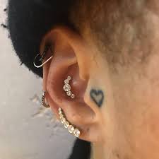 428 Likes 1 Comments Maria Tash Maria Tash On Instagram Adwoa Aboah Came In For A Few Piercings Hammered Hoop Earrings 14k Gold Hoop Earrings Earrings