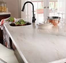 cultured marble vs corian vs quartz vs