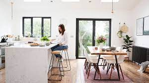 The island offers space for a breakfast bar. Styling A Kitchen Island With Seating 13 Stunning Looks To Try Real Homes