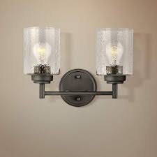Crafted from metal, this fixture uses 2 long t10 light bulbs to bring soft lighting to an entry, hallway, bedroom or living room. Kichler Winslow 9 1 4 High Olde Bronze 2 Light Wall Sconce 44a86 Lamps Plus