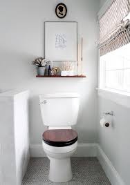 One of the best small laundry ideas and designs is an ironing board you can fold up and hide when not in use. How To Double Your Storage In A Small Bathroom