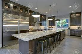 modern kitchen with brown kitchen