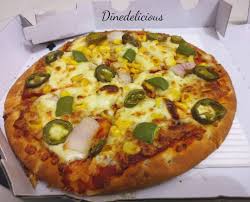 pizza from ovenstory the crust was fluffy soft fresh and really good i was always a fan of dominos cheese burst or thin crust pizza but this has changed my