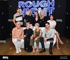 Rough Night" cast members, from left back row, Ryan Cooper, Jillian Bell,  director Lucia Aniello, Kate McKinnon, Ilana Glazer, Colton Haynes,  Scarlett Johansson, Zoe Kravitz and Paul W. Downs participate in a