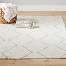 Marmalade™ stars 4' x 5'3 hand tufted multicolor washable area rug. Shapes Washable Rug