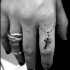 The design is basically a rosary chain that is present on the surface of the index finger. 145 Cute And Discreet Finger Tattoos Designs
