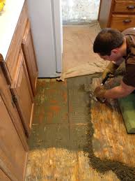 How To Remove Mortar From Subfloor 1 Lay A Soaking Wet Towel On The Mortar And Let Sit For 10 Minutes 2 Get Yo Diy Renovation Wet Towel Home Improvement