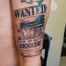Tattoo uploaded by Ross Howerton • A black and grey depiction of one of the wanted  posters from One Piece by Hemce (IG—hemce). #blackandgrey #Hemce #OnePiece  #RoronoaZoro • Tattoodo