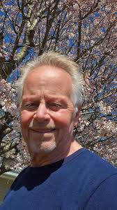 Old Man Laying Flowers Southport