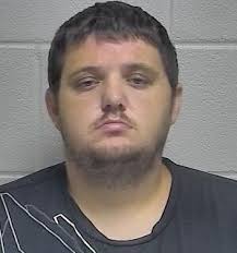 Eminence police seize guns and drugs in bust