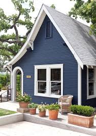 White trim brightens the entire house and makes the blue look crisp and finely detailed. 31 Exterior Colors For Small Cottages Ideas Exterior House Colors House Colors House Exterior