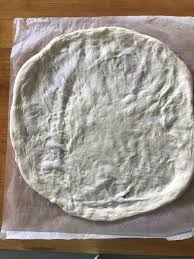 5 Tips For Stretching Out Pizza Dough Like A Pro Pizza Dough Outdoor Pizza Oven Recipes Pizza Oven Recipes