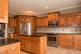 kitchen golden oak cabinets with