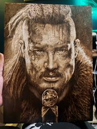 My first attempt at Pyrography, (wood burning). Not complete, but don't  want to give away how im going to finish it off yet. Golden eagle portrait  .