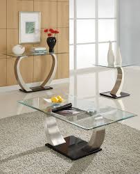 Beautiful danish coffee table with smoked glass top and teak legs. Glass Coffee Table Design Ideas