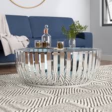 The geometric stainless steel legs create an airy yet sophisticated feel for the spoke coffee table. Stainless Steel Coffee Tables You Ll Love In 2021 Wayfair