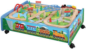 If you're tired of your floor acting as a toy land mine for your feet with tons of toy pieces scattered across it, you need a train table. Amazon Com Maxim Enterprise Wooden Train Set With Play Table 62 Pc Set Over Under Bridge Trackpiece Fun Toy Railway For Girls Boys Compatible With Thomas Brio Melissa Doug