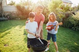 Maybe you would like to learn more about one of these? Premium Photo Girl Playing Ukulele Standing Near Her Father And Brother Cooking Food On Barbecue