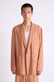 They were for hiding a paunch. Unisex Lemaire Double Breasted Jacket Camel Garmentory
