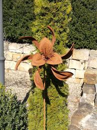 Garden spinner with antique spoons. Edelrost Windrad Loffelblute Angels Garden Dekoshop