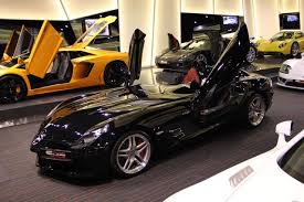 Mercedes Sls Stirling Moss In The Best Car Dealership In The World Best Car Dealerships Car Dealership Mercedes Benz Mclaren